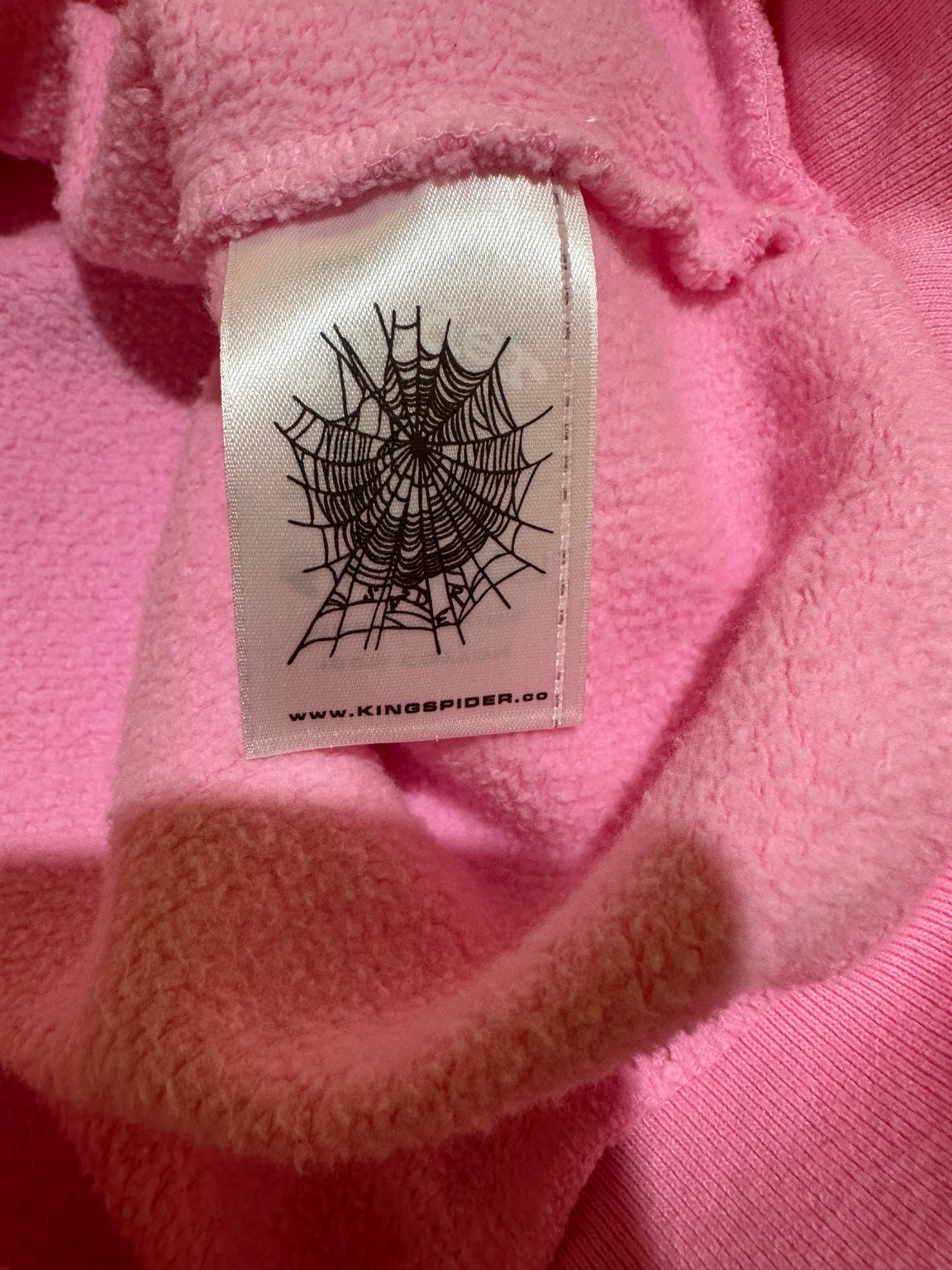 Sp5der Pink OG Web Rhinestone Zip Up Kingspider tag