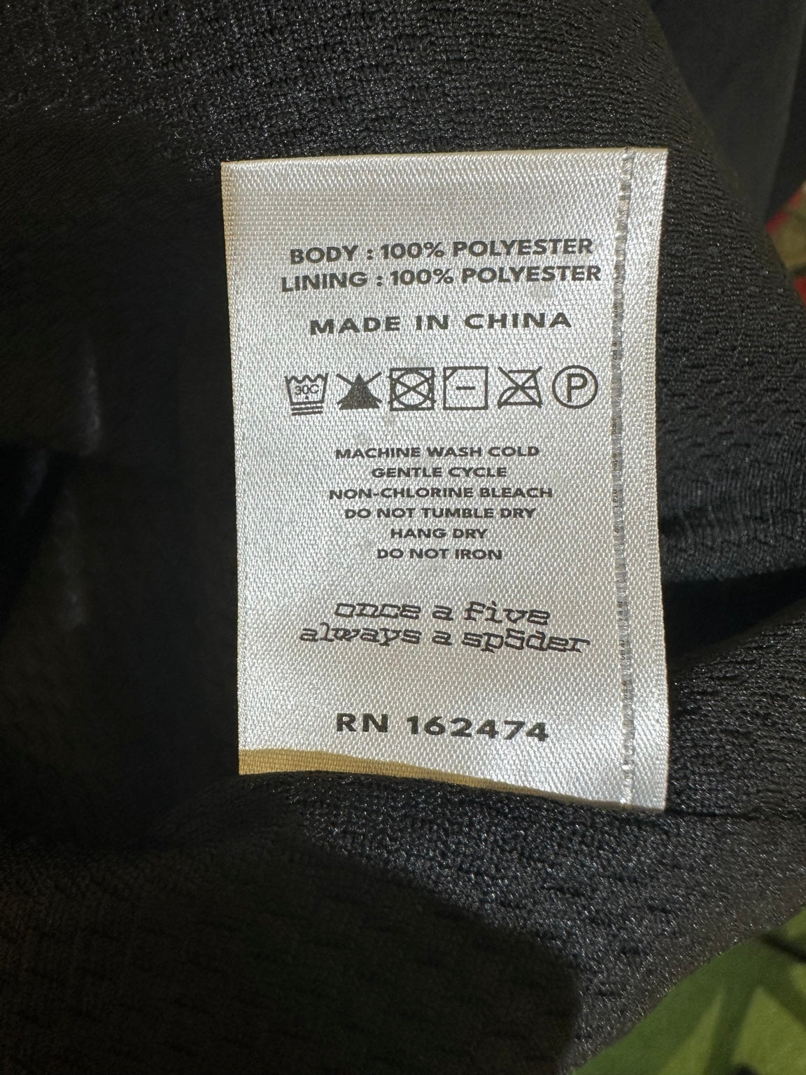 Sp5der Track Jacket Black White care tag