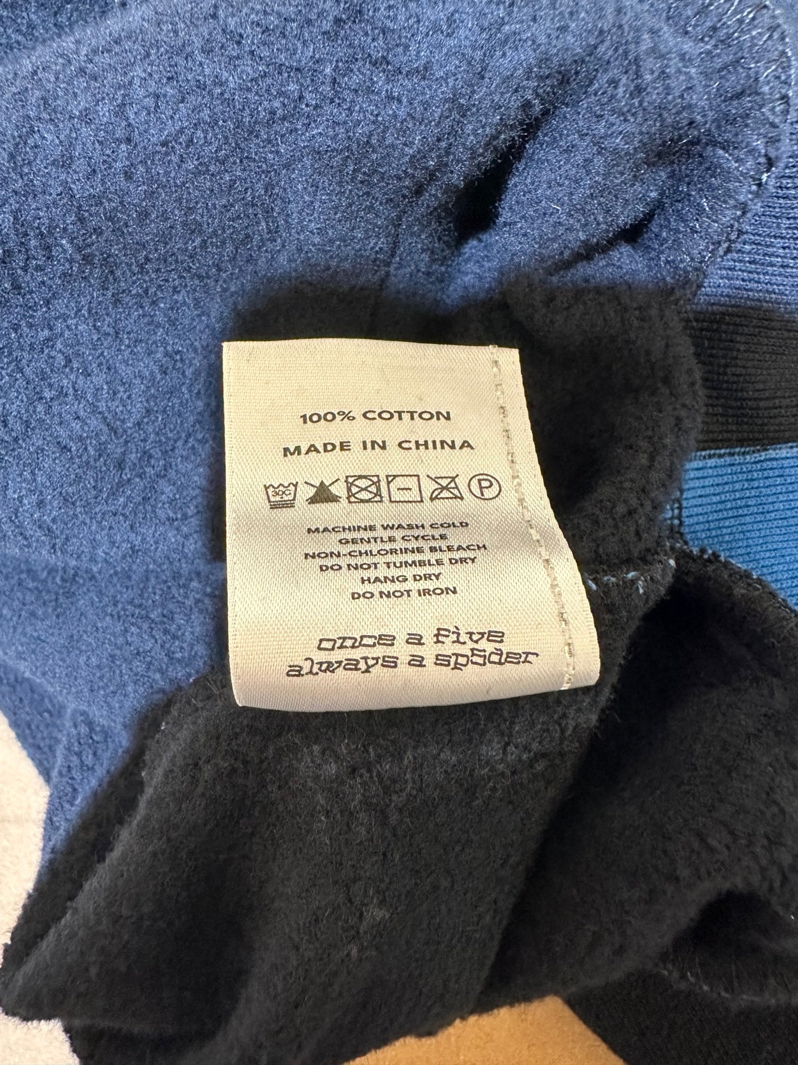 Sp5der Overspray Zip Up care tag